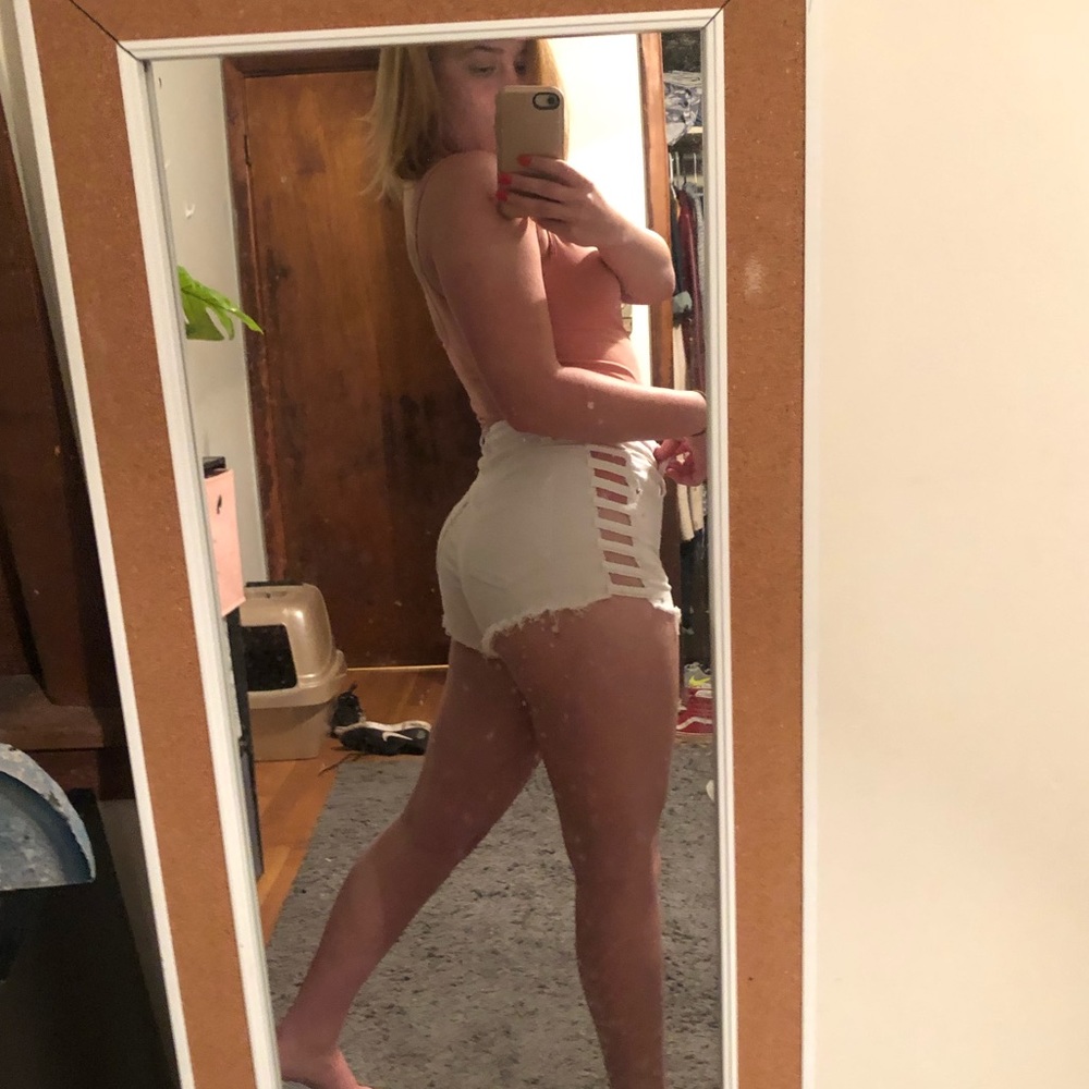 White shorts with cutouts
